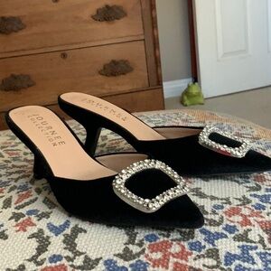 Black velvet mules with rhinestone buckle